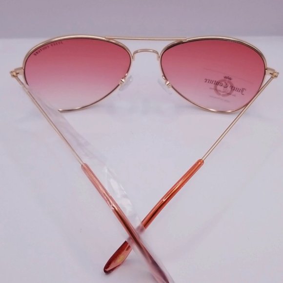 Juicy Couture rose gold frame sunglasses light pink aviator tinted lenses